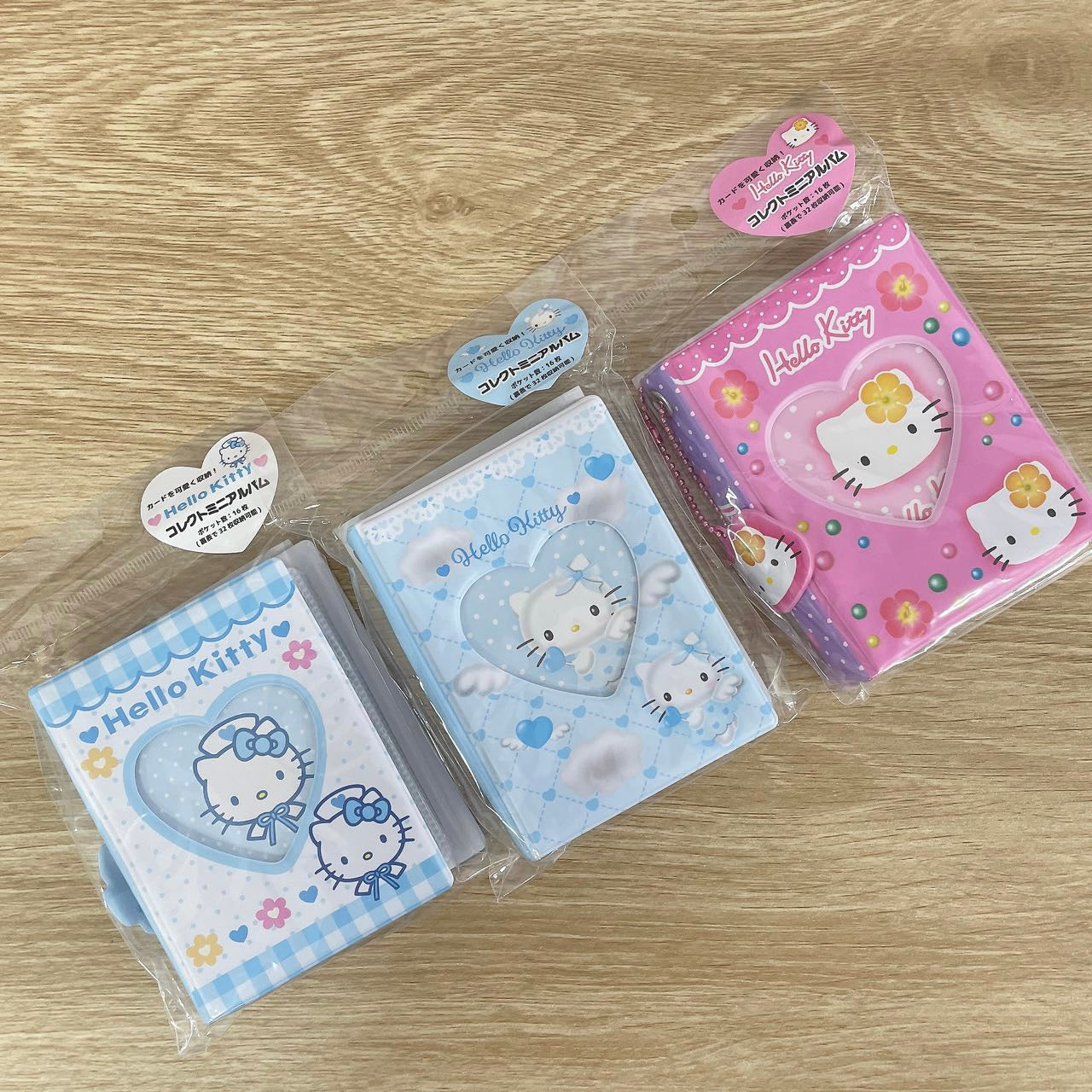 Sanrio | 90S Hello Kitty Mini Album With Charm H104Xw75Xd26Mm 16 Pockets (Angel)