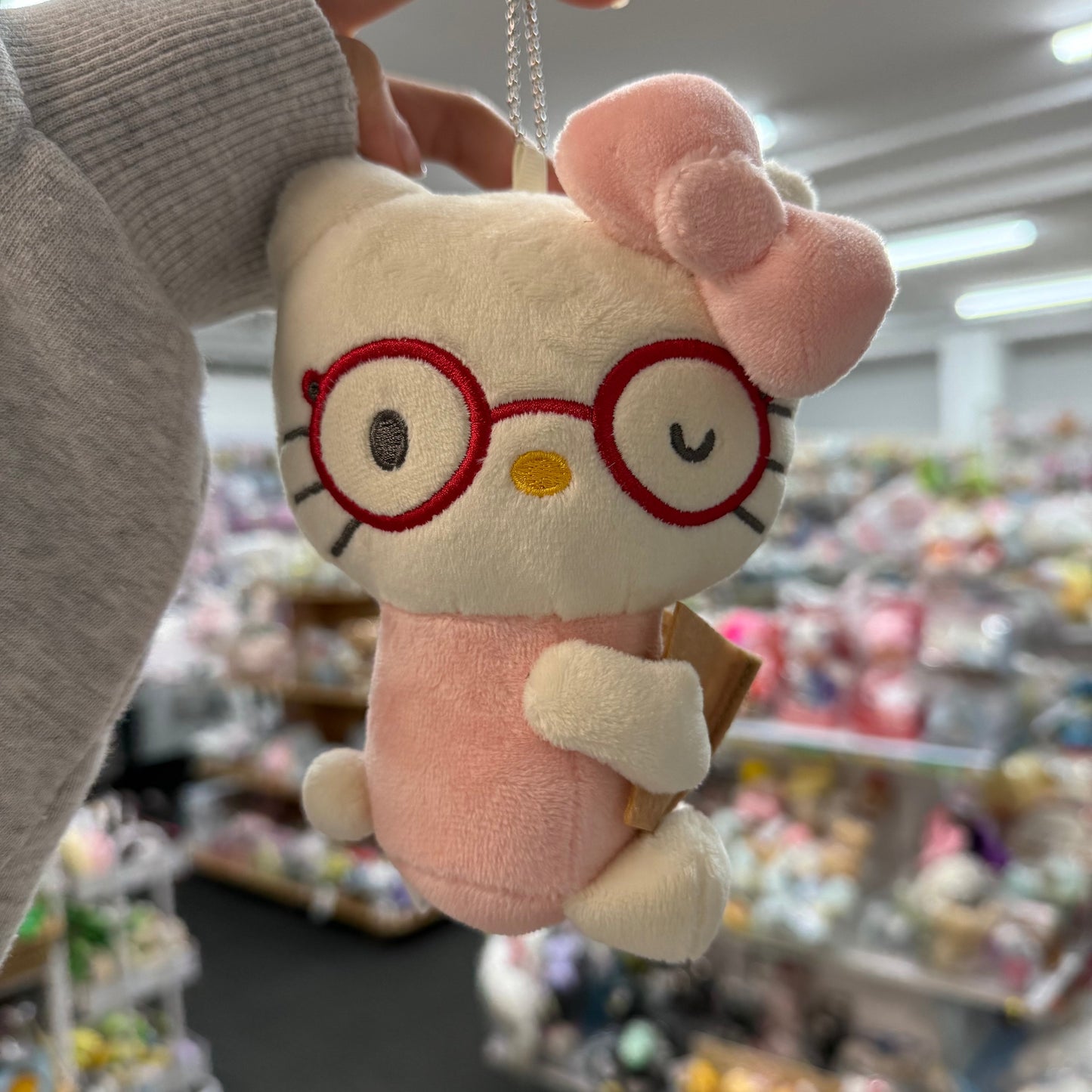 SANRIO x Avail | Hello Kitty 50th Anniversary Mascot Holder Plush Keychain 14 x 12cm (Reading)