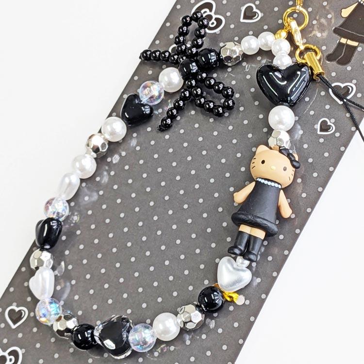 SANRIO | Hello Kitty Style-up Long Legged Phone Strap 124×72×11mm (Black)